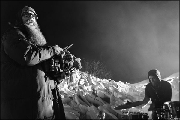 Shaun Hodson / Loki Films, while Adam Lewis adjusts his drum kit. Photography by Greig Clifford